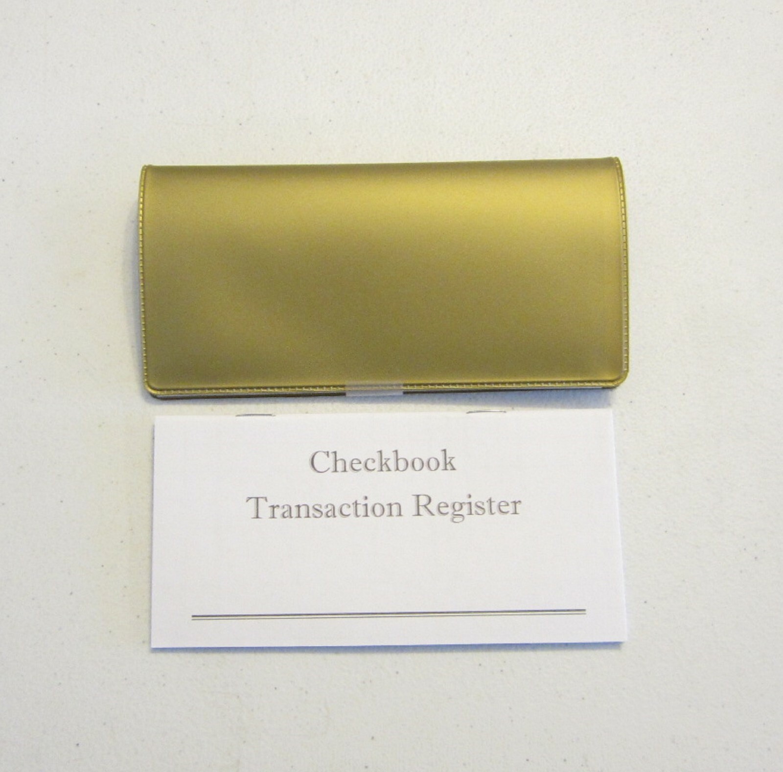 1 NEW GOLD VINYL CHECK BOOK COVER & 12 NEW CHECKBOOK TRANSACTION REGISTERS