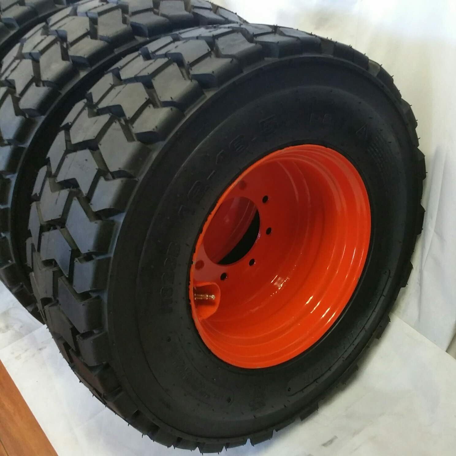 (4) 12-16.5 ROAD CREW RS102 14 PLY Skid Steer Loader Tire with Orange Color Rims