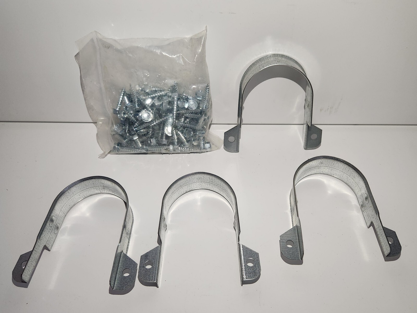 2″ CPVC TWO-HOLE 90° SIDE MOUNT STRAP SKU:077 ( ONLY SALE BOX OF 100 PCS )